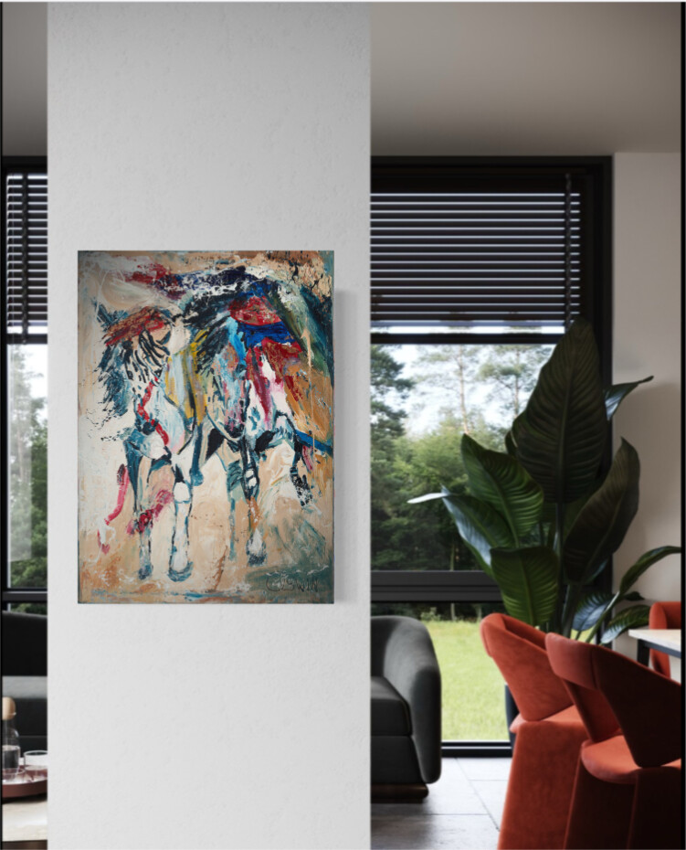 Painting of horses in the desert sand. 